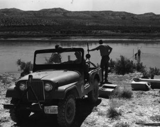 Agency personnel set up a rotenone drip station on the Green River 25 miles north of the Utah State LinePhoto by Rex Gary Schmidt. Courtesy of National Conservation Training Center. #4435