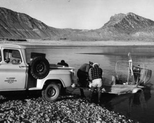 Putting an airboat into the Green River to inspect the ongoing rotenone operation.Photo by Rex Gary Schmidt. Courtesy of National Conservation Training Center. #4436