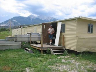 Because they need abundant clear water, fish culture facilities tend to be located in beautiful places. This retrofitted trailer is part of Colorado's Chalk Cliffs Rearing Unit, in Nathrop, Colorado.Photo by Anders Halverson